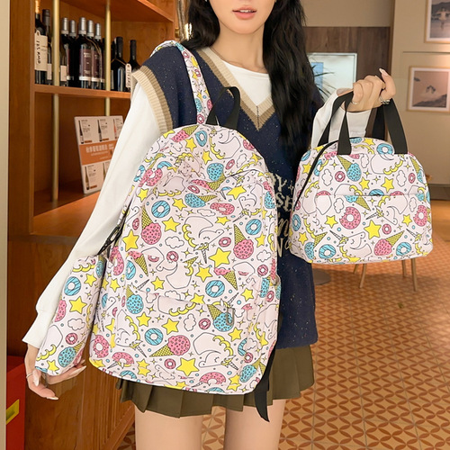 Unique versatile multi-item set backpack 2024 new pattern graffiti painted middle school student lightweight large capacity double shoulder bag