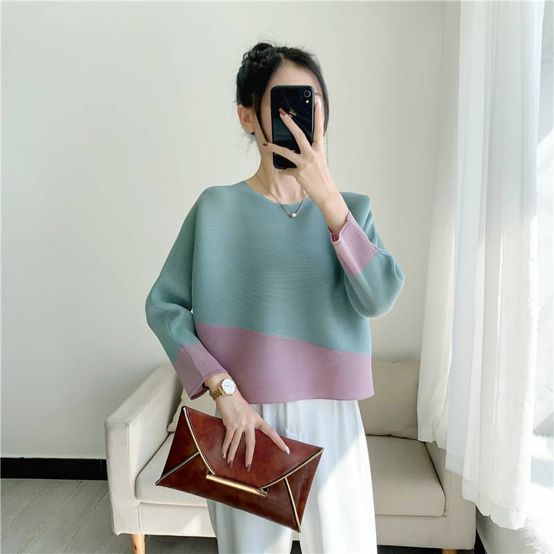 2022 Primavera y Otoño Nueva tapa plisada palillo de dientes de las mujeres a juego de color suelto urbano casual camiseta moda todo a juego