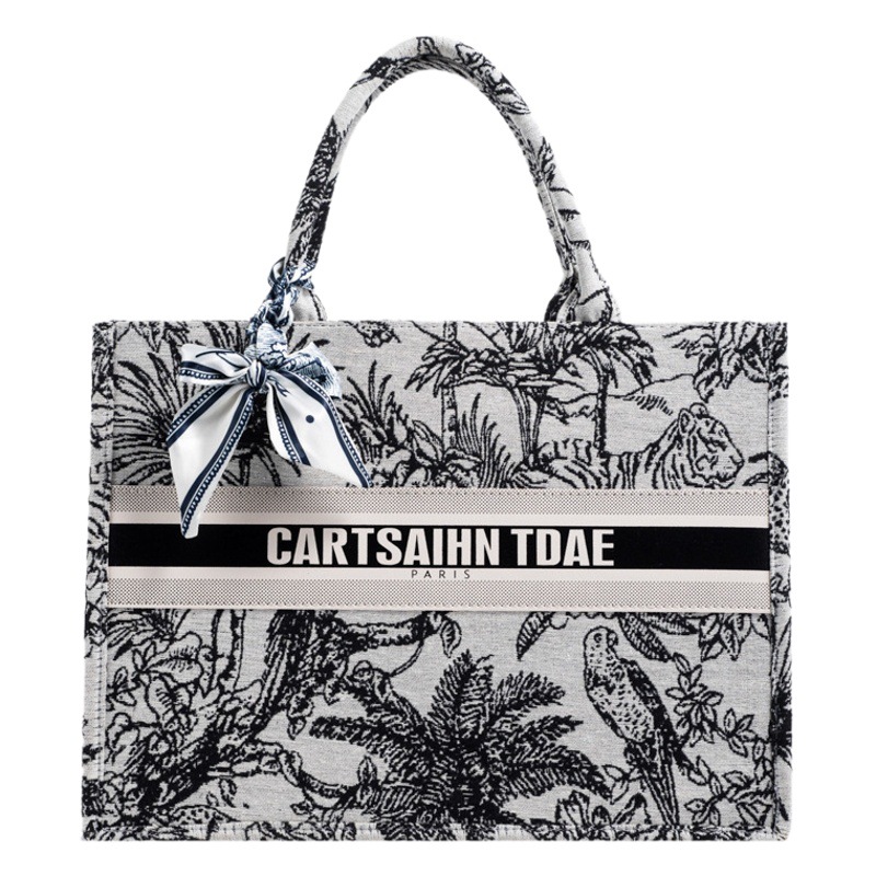 Bolso de mujer 2025, nuevo estilo transfronterizo, bolso tote con estampado de letras, con un toque de alta gama, diseño exclusivo, práctico para salidas y viajes diarios.