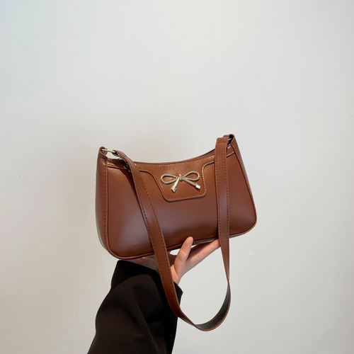 Fashion butterfly knot 2025 solid color Korean version trendy quality stylish commuting shoulder underarm baguette bag for women