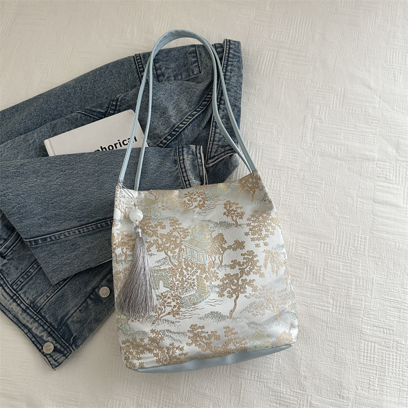 Nueva bolsa bordada de estilo chino de gran capacidad para mujeres 2024 nueva bolsa de hombro de viaje de verano