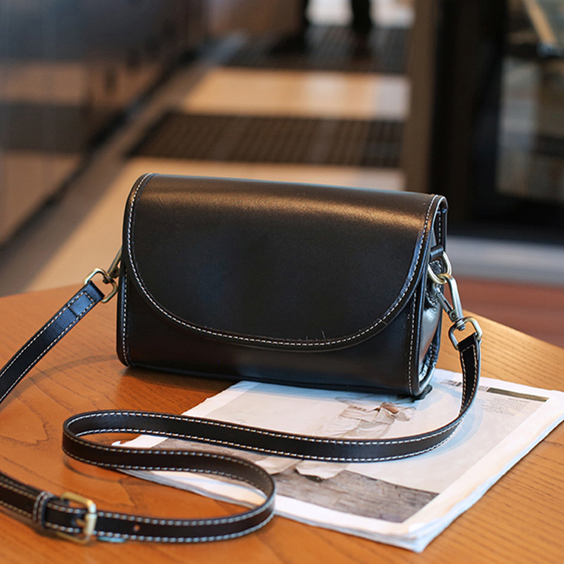 2024 nuevas bolsos de cuero retro para mujeres con capa de cabeza de piel de vaca bronceada vegetativa bolsos de hombro moda bolsos de hombro uno por uno