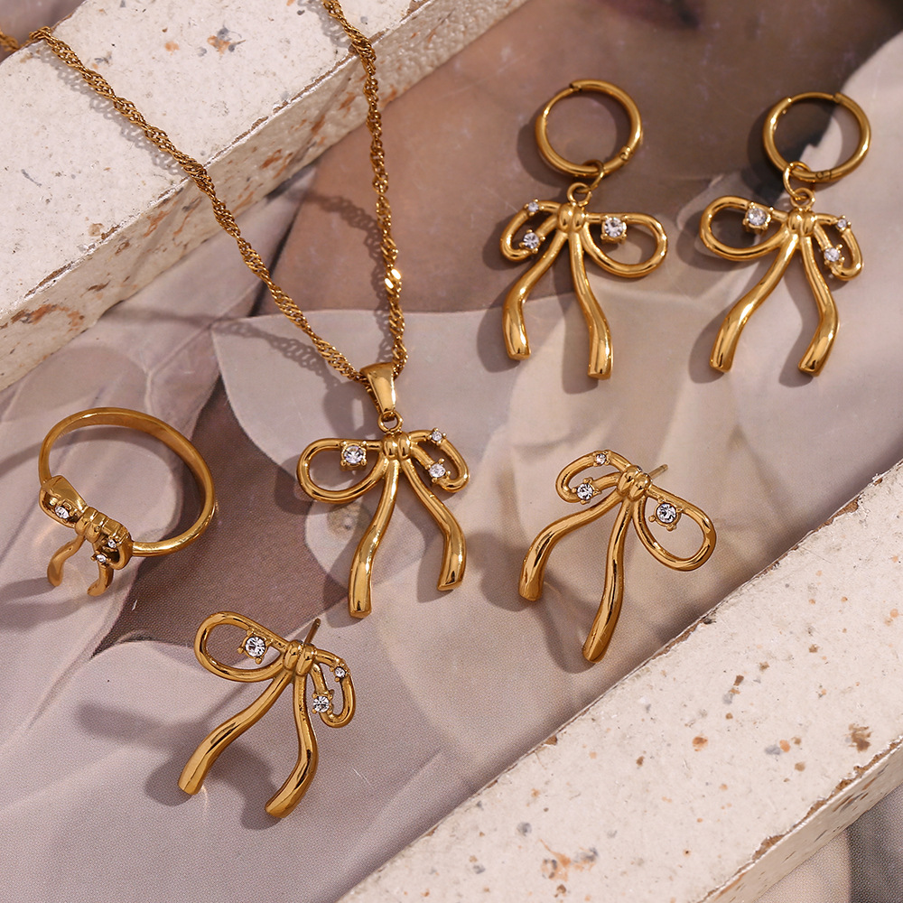 Hot Sale Rhinestone Inlaid Bow Knot Stainless Steel Pendant Necklace Earrings Ring Sets