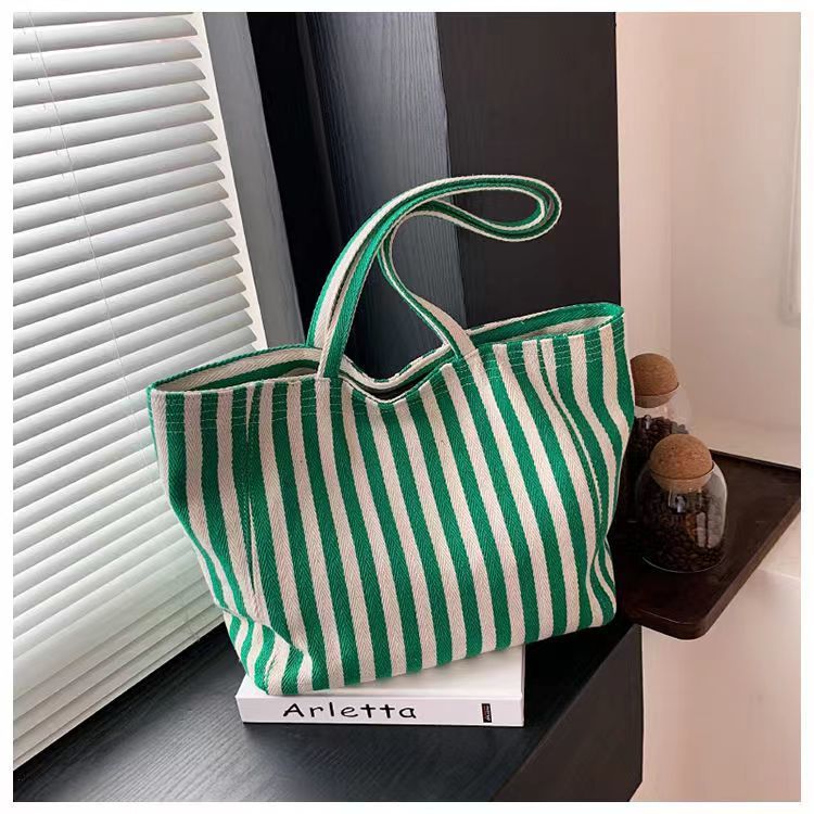 Pequeña bolsa de lona a rayas frescas de hombro para mujeres, bolsas escolares de clase de gran capacidad, bolsas de compras japonesas y coreanas, bolsas especiales.