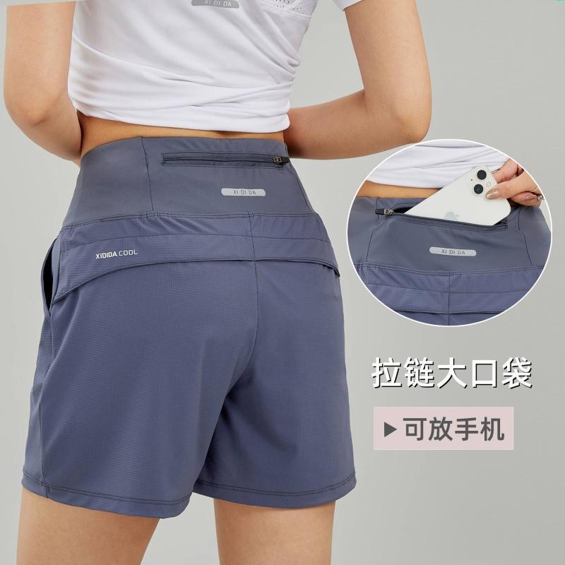 Pantalones cortos deportivos de mujer hielo rápido secado bolsillo de cintura trasero puede poner el teléfono móvil yoga pantalones casuales sueltos corredores cortos comercio exterior