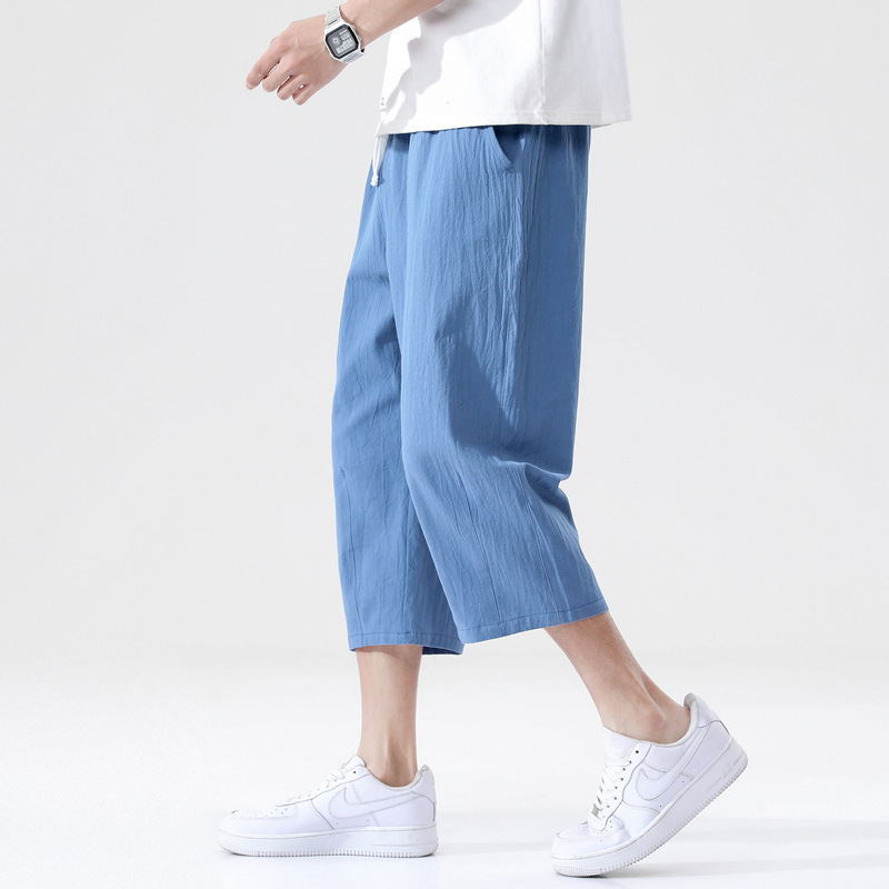 Pantalones recortados pantalones casuales de los hombres de moda verano de los hombres delgados sueltos versión coreana de los hombres de algodón y lino de gran tamaño al por mayor