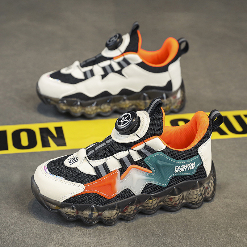 Zapatos infantiles para niños y niñas de verano hueco respirado botón giratorio de malla para niños de mediana edad zapatos deportivos casuales para estudiantes primarios