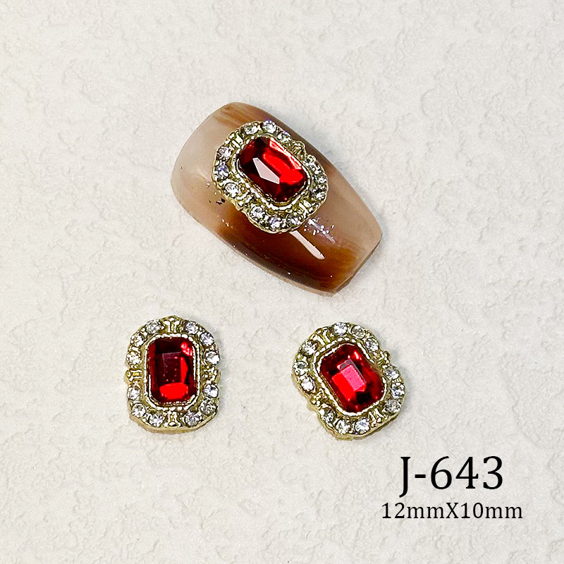 2023 Nueva joyería de uñas Año nuevo rojo aleación conejo rojo mariposa de cristal pintura en aerosol arco accesorios de diamantes de uñas