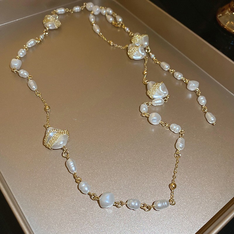 Collar con cuentas de perlas de gota de agua con diamantes transfronterizos otoño e invierno cadena de suéter de lujo ligero francés moda todo fósforo joyería de alta gama