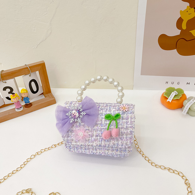 Nuevo bolso de mensajero de La Niña de los niños niña estilo de Chanel estilo occidental Linda niña linda de dibujos animados portátil pequeña bolsa