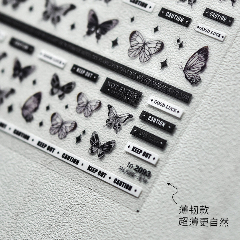 Tomoni en línea estilo de celebridad pegatinas de uñas cinta estilo de Chanel alivio mariposa letras inglesas estilo oscuro textura de uñas