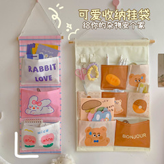 Fabric storage bag hanging behind dormitory door wall-mounted storage bag college student bedside wall hanging mobile phone storage pocket