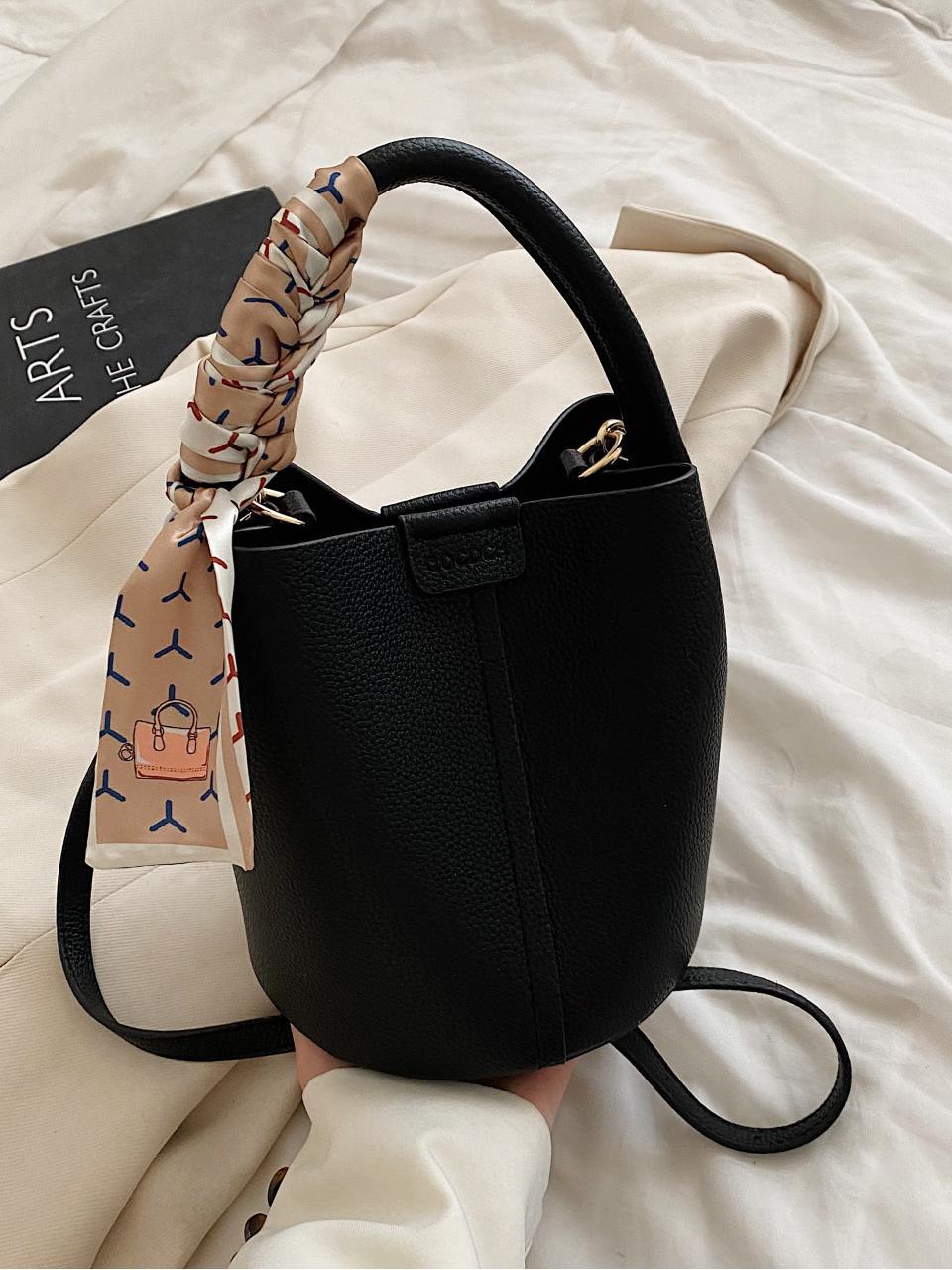 Bolso de cubo de mano de estilo explosivo transfronterizo 2025 nuevo bolso de hombro de tendencia simple popular bolso de mensajero de alta gama súper caliente