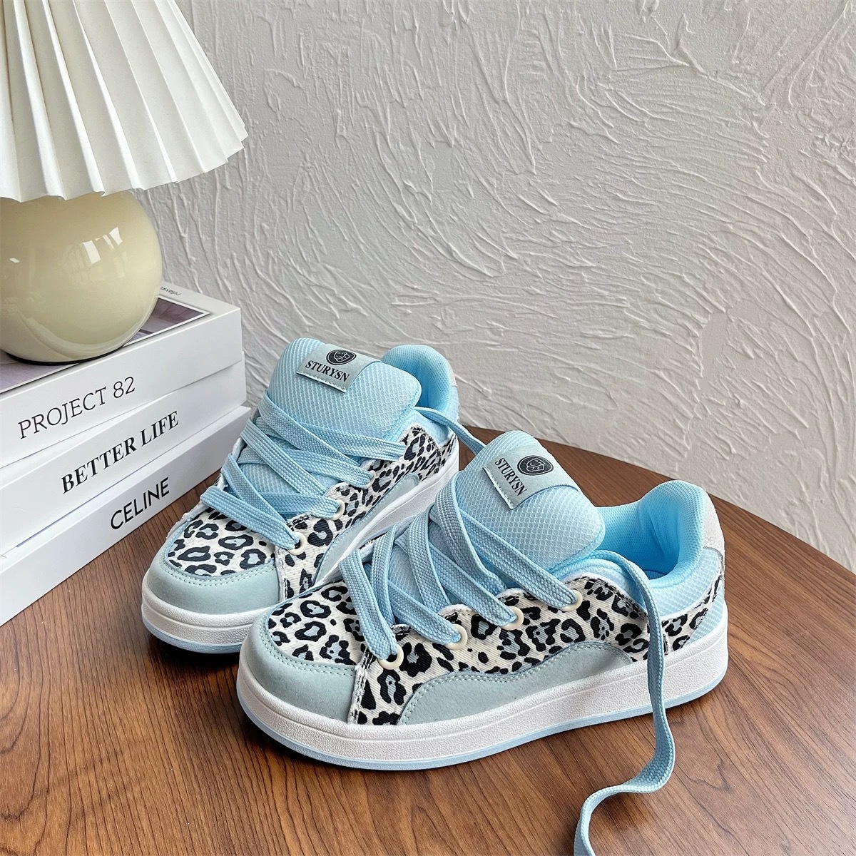 2026 primavera y otoño nuevo original azul de hielo leopardo zapatos de pan de suela gruesa estilo coreano versátil retro zapatos de skate casuales para estudiantes