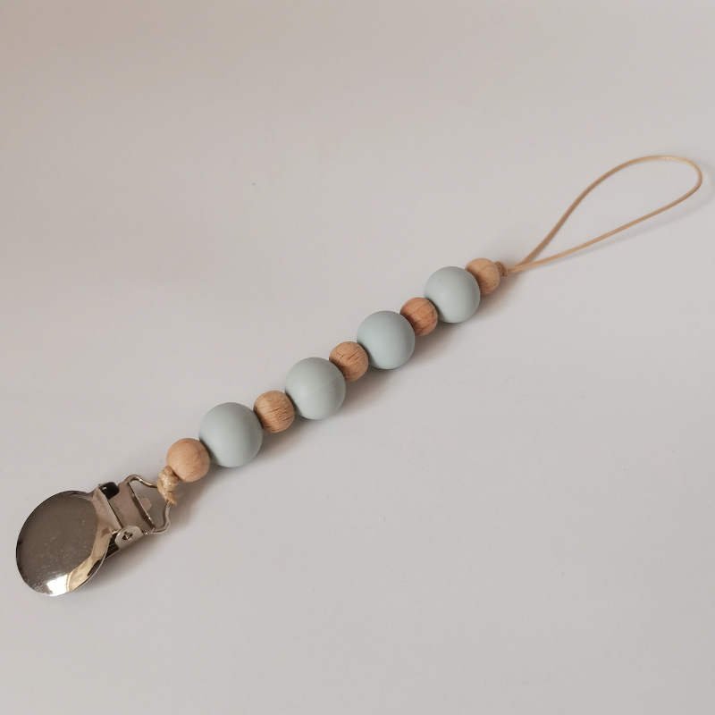 Nuevo bebé suministros de silicona perlas Cadena de pezón calmante bebé DIY creativo mordedura molar cadena anti-caída