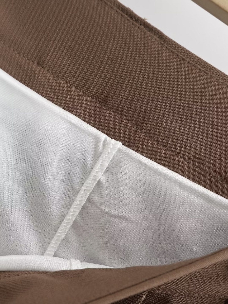 Falda plisada estilo colegial para mujer con cinturón antifugas_voghion.com