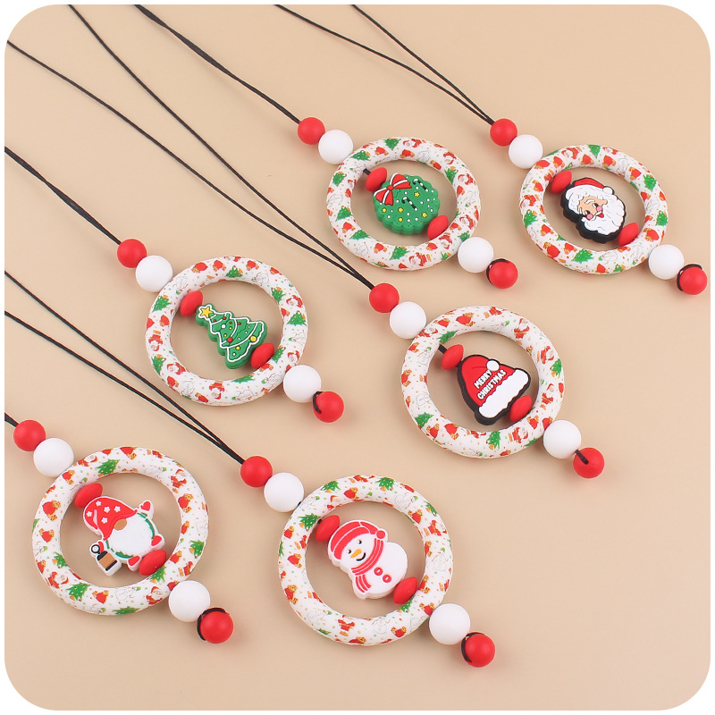 Bebé de dibujos animados de Navidad collar bebé creativo de silicona Santa Claus mordedura COLLAR COLGANTE hecho a mano