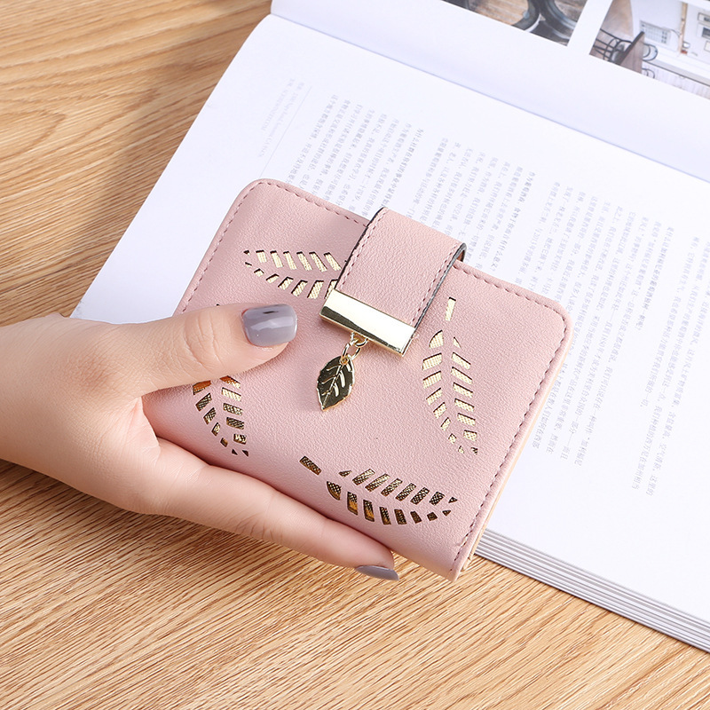 New Korean style short women's wallet with zipper, buckle, hollowed-out leaf design, small wallet, large capacity money holder, card holder wholesale.