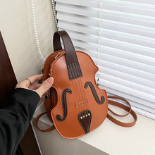 可爱搞怪双肩背包包女2025新款潮时尚手提单肩包个性斜挎小提琴包