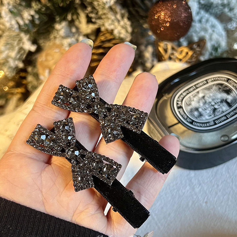 高級感のあるドリルの蝶結びの髪の挟みの側の前髪はカモの口を挟んで一字を挟んで後頭部のクリップの頭飾りのカードを挟みます。