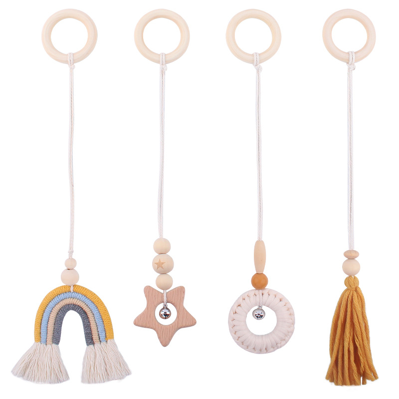 Bebé suministros dibujos animados Arco Iris colgante de cuatro piezas niños de educación temprana hecho a mano tejida haya sonajero juguete