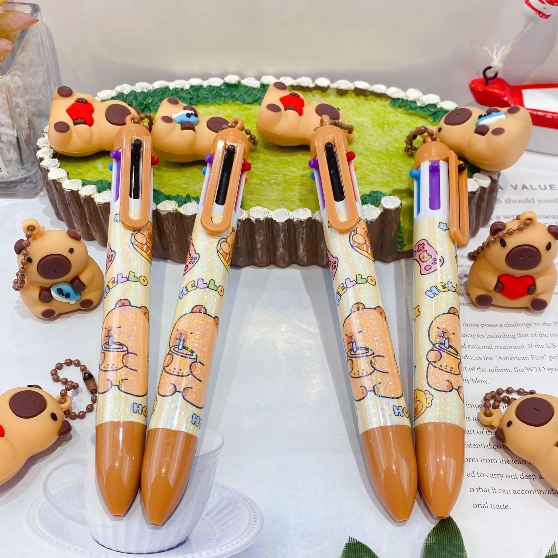 Nuevo colgante de muñeca Kapibala cultural y creativo bolígrafo de seis colores de dibujos animados lindo bolígrafo de seis colores bolígrafo de mano de color