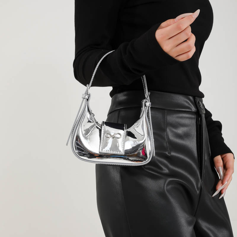 Bolso de moda coreano brillante de mujer simple bolso de arco de color sólido 2025 nuevo mini bolso de teléfono móvil para mujeres