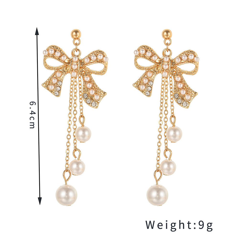 Dating Romantic Sweet Pearl Bow Retro Long Pearl Tassel Earring display picture 1