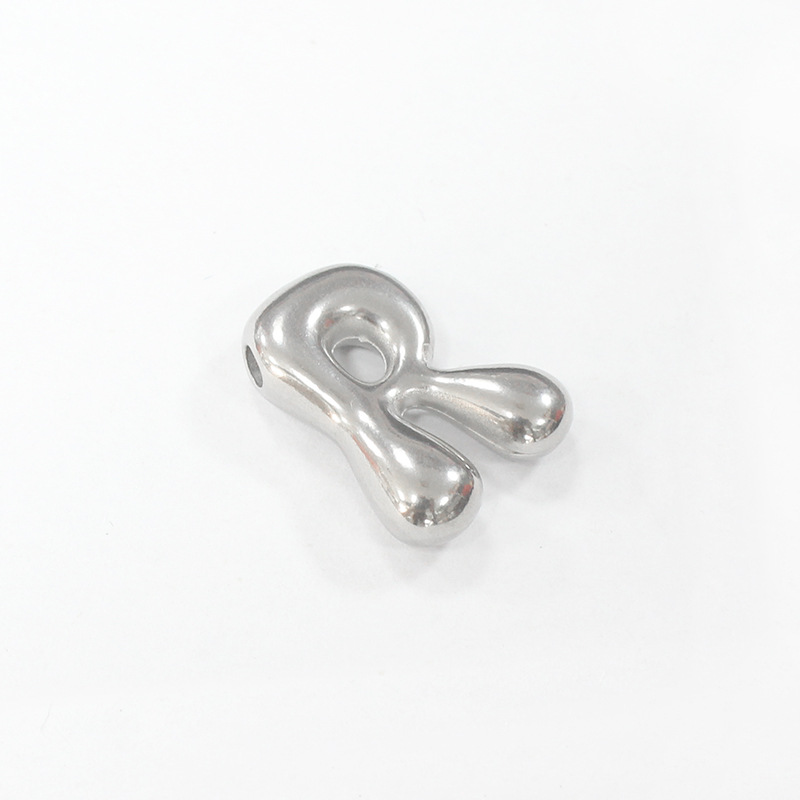 Steel-colored R letter (with horizontal hole on top) thickness 5.2*width 14*height 18mm*aperture 1.8mm (unit weight 3.66g)