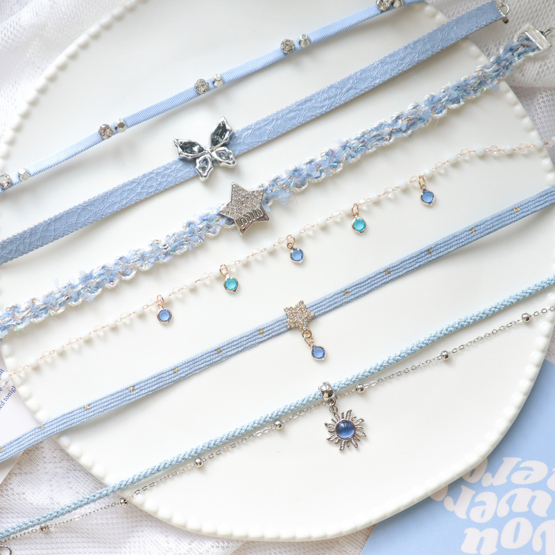 Cross-border high-end jewelry haze gray baby blue clavicle chain choker neck chain butterfly sun pendant necklace women