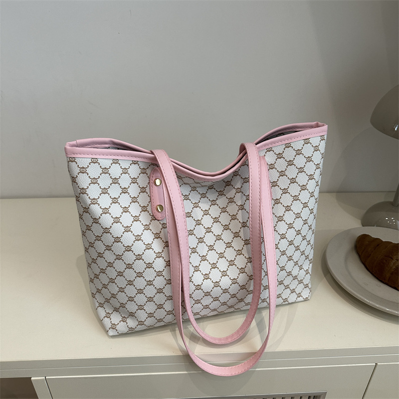 Bolso Tote personalizado de paso relajado de gran capacidad 2025 nuevo hermoso bolso de hombro de moda de nicho con textura bolso femenino