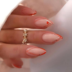 Almond-shaped nail art with orange-red French-style rule lines, wearing gold powder decorations, Instagram-style hot girl fake nails