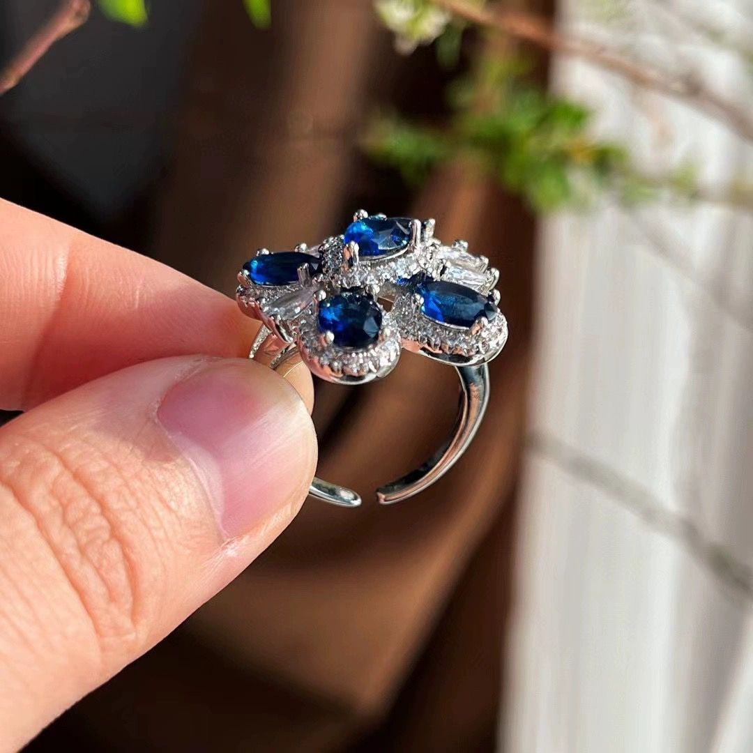 Colored gemstone deep sea sapphire layered flower ring for women, open design, elegant and versatile, unique floral style, understated luxury index finger ring.