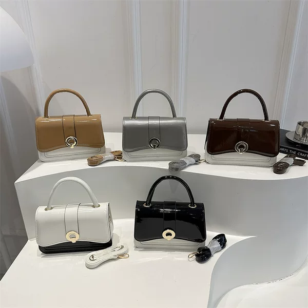 Stylish and trendy crossbody bag for commuting, featuring a simple and chic design, a unique PU material, and a fashionable lock closure. It's a small square bag that can be carried as a shoulder bag or handbag