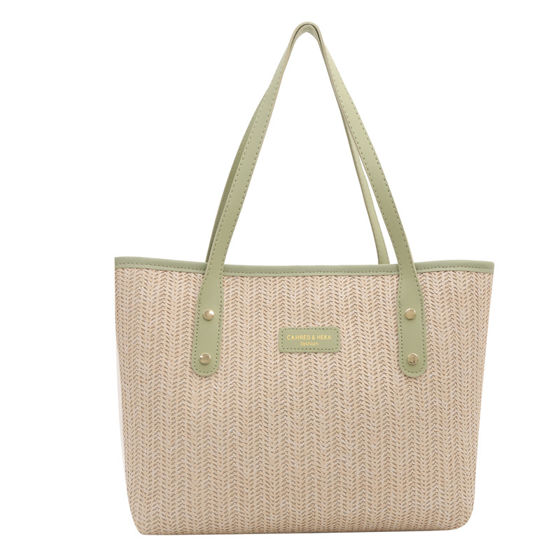 Bolso de paja de gran capacidad para viajeros para mujer 2024 nuevo estilo de moda y estilo occidental, bolso de axilas de color de contraste, bolso de Tote popular de este año