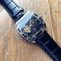 Silver case black dial black strap