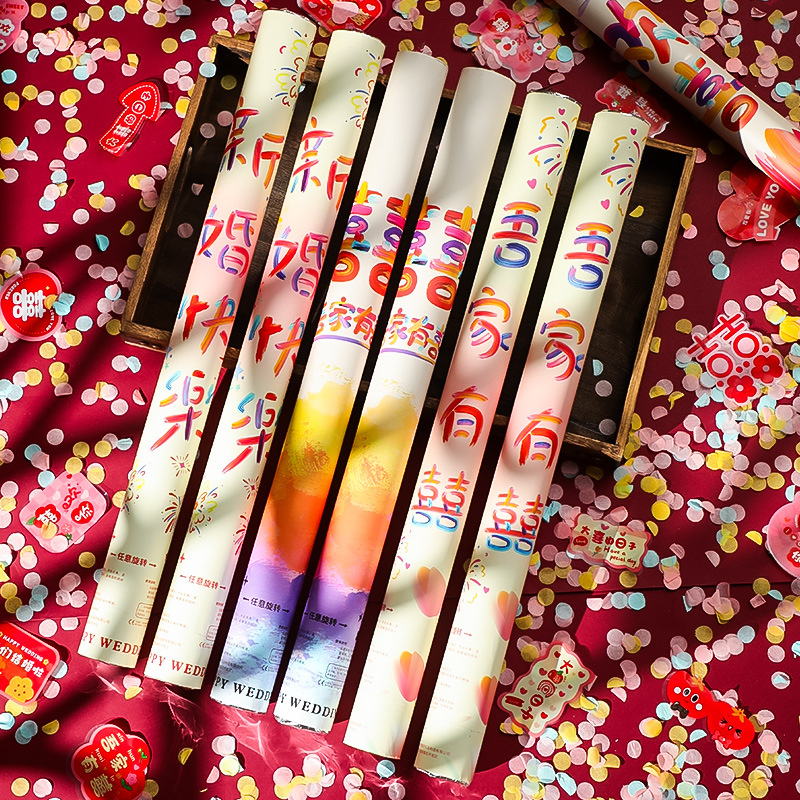 結婚礼砲の花火の筒の手をねじって式の結婚式のカラーは噴花の筒を持って羽毛の礼儀の筒の砲の結婚祝いの用品の大全書を持ちます。
