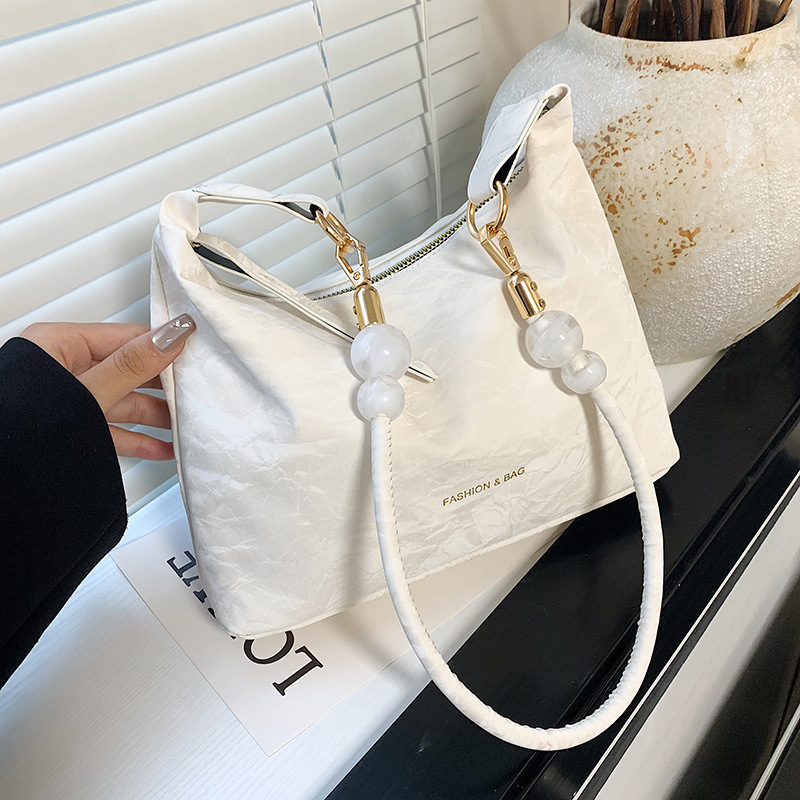 Bolsos de nicho de diseño de alta calidad para mujeres 2024 nuevo bolso de mano, bolso de hombro de moda, bolso de brazo