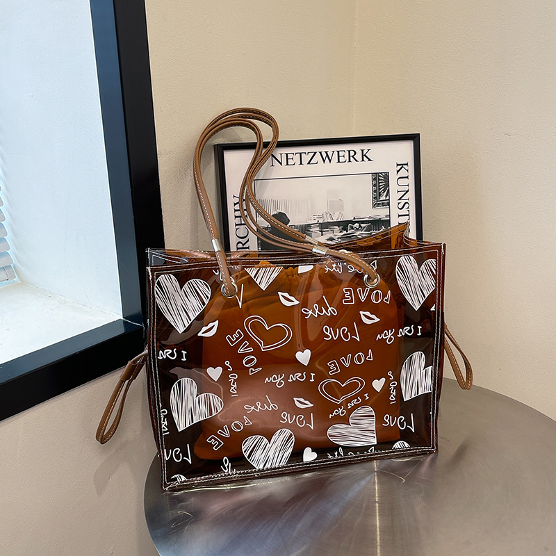 Bolso de nicho transfronterizo 2025 nuevo bolso de niño y mujer bolso de gelatina transparente bolso de hombro de gran capacidad de amor