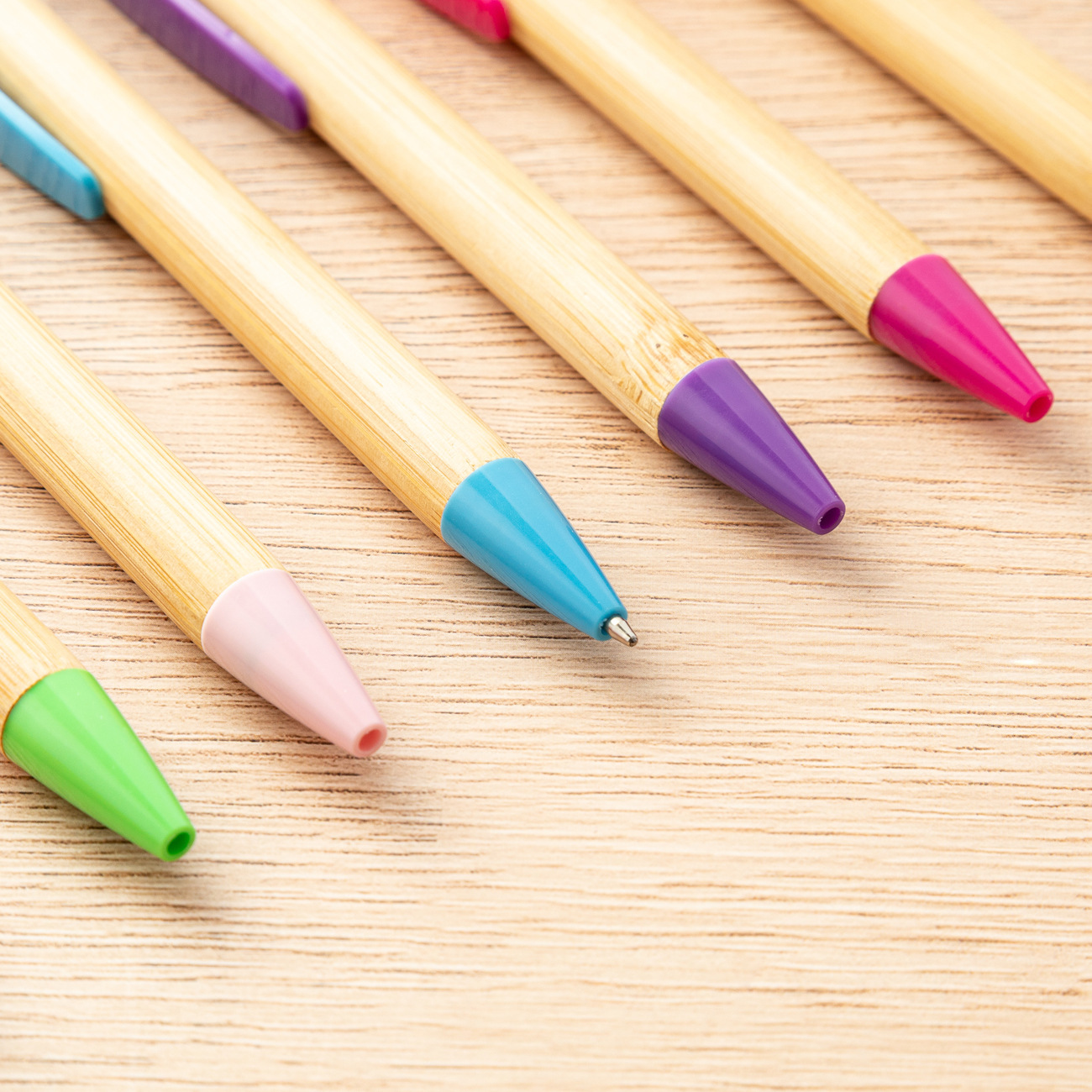 Multicolor bolígrafo de bambú de acción ambiental bolígrafo de madera de bambú al por mayor logotipo imprimible bolígrafo de regalo de publicidad de bambú