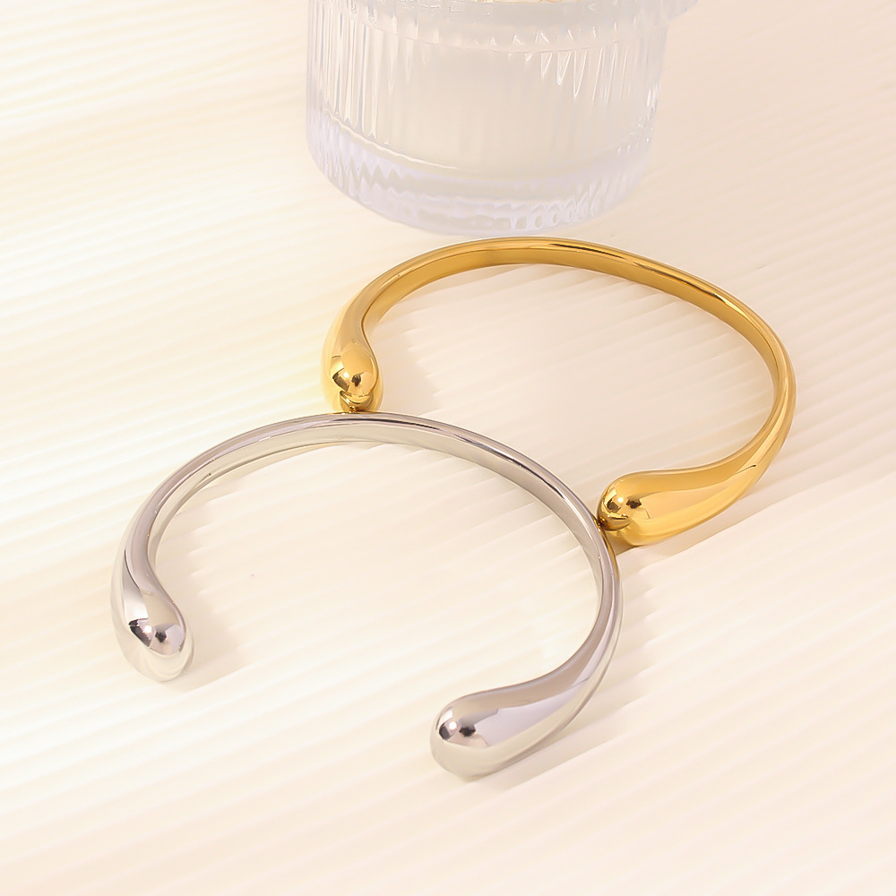 Joyas transfronterizas europeas y americanas exageradas gotas de agua simples acero titanio espejo brillante brazalete abierto de 18 quilates accesorios de mano de viento frío