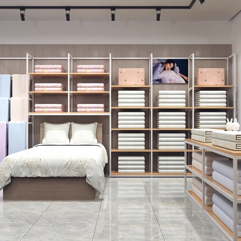 Estante de tienda textil casera almohada edredón estante de exhibición de cuatro piezas conjunto de ropa de cama pijamas estante de exhibición Gabinete