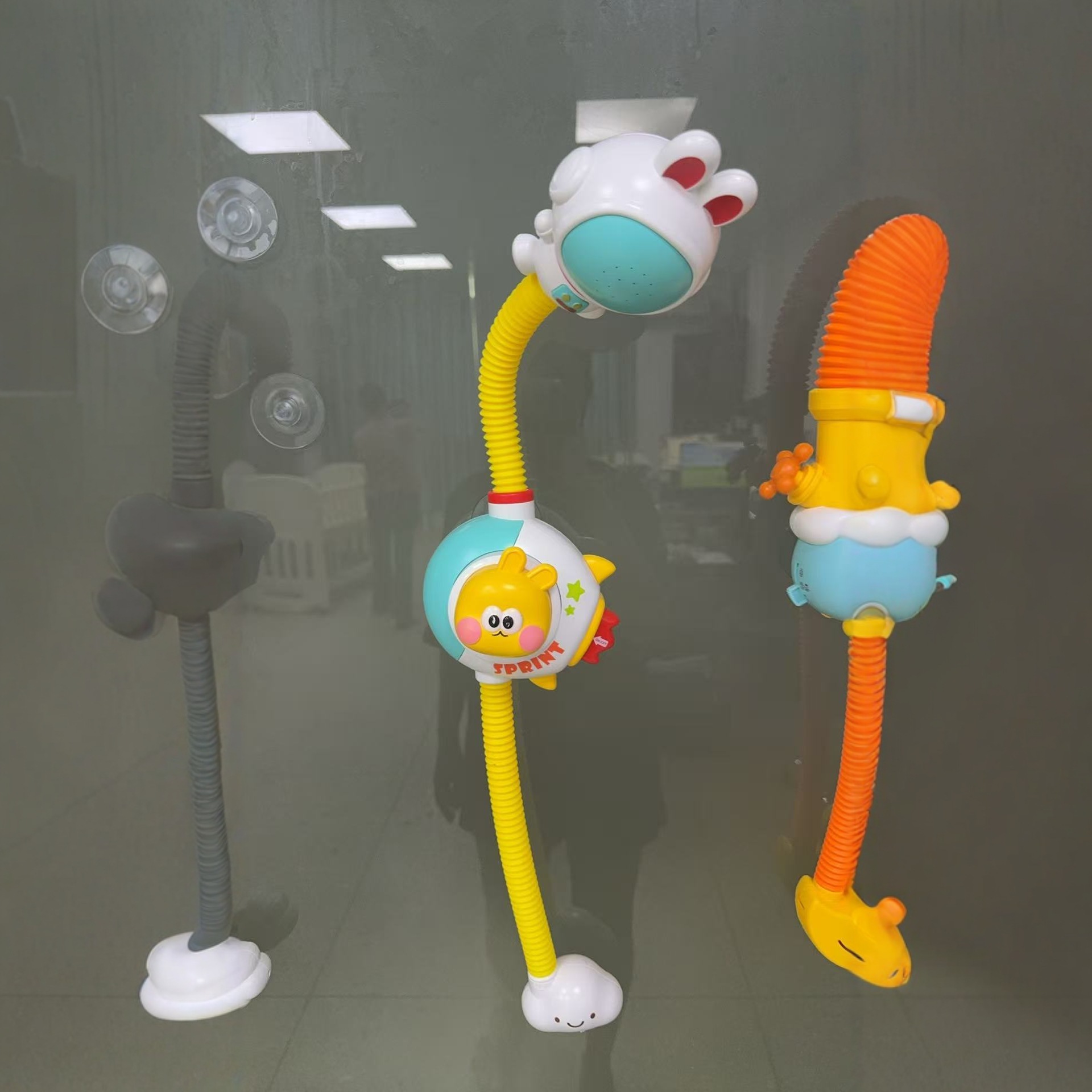 Conejo transfronterizo rociador cohetes juguetes para niños submarinos eléctricos niños niñas bebés rociadores juguetes