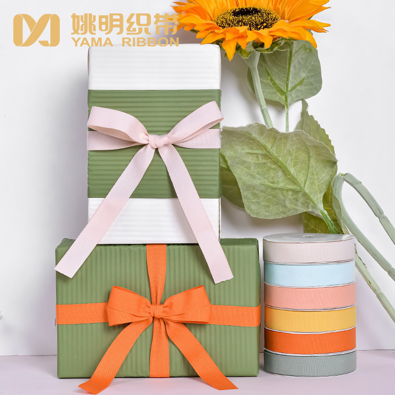 En stock al por mayor Yao Ming imitación algodón cinta 4 Especificaciones 27 colores accesorios de ropa caja de regalo embalaje liso imitación algodón cinta
