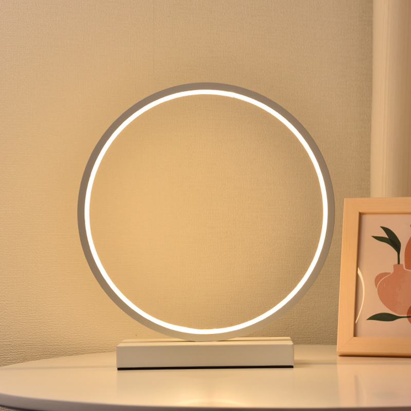 Lámpara de escritorio LED nórdica con luz ambiental, diseño circular, ideal para dormitorio o escritorio