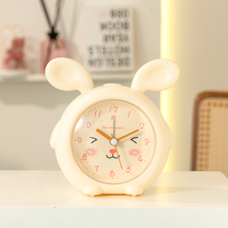 Fábrica directa lindo despertador de dibujos animados color caramelo silencioso con luz despertador para estudiantes WenChuang especial pequeño reloj despertador