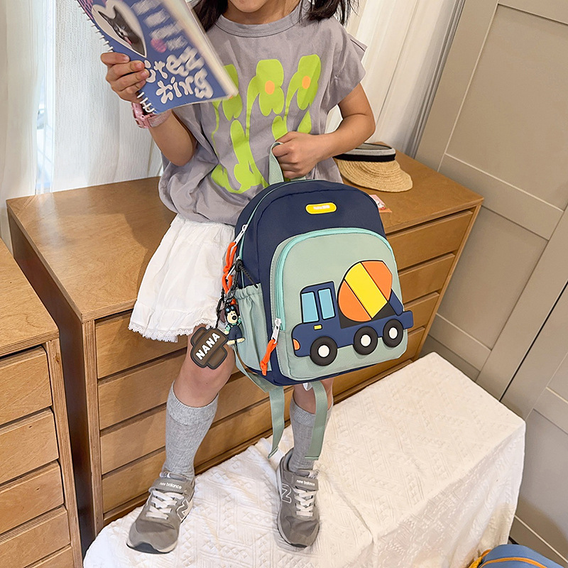 Bolsas escolares de gran capacidad para estudiantes de primaria, dibujos animados, excavadoras lindas, mochilas para niños y niñas, nueva ola de mochilas para niños transfronterizos