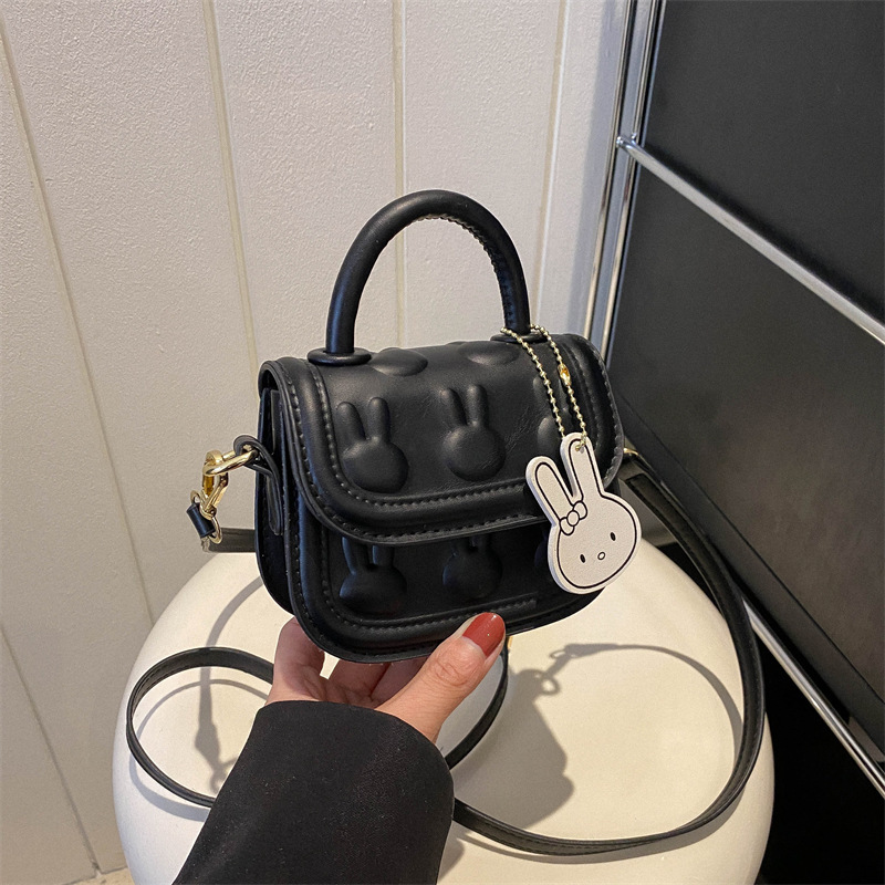 Bolsos para niños, bolsos de mochila encantadores, bolsos de moda de dibujos animados, bolsos de montar de mano, bolsos de cambio para bebés de niñas