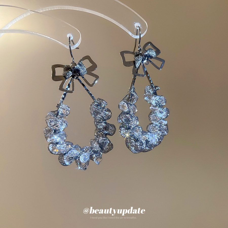 Pendientes colgantes con lazo hueco de diamantes Pendientes de temperamento de moda retro Pendientes de todo fósforo de personalidad