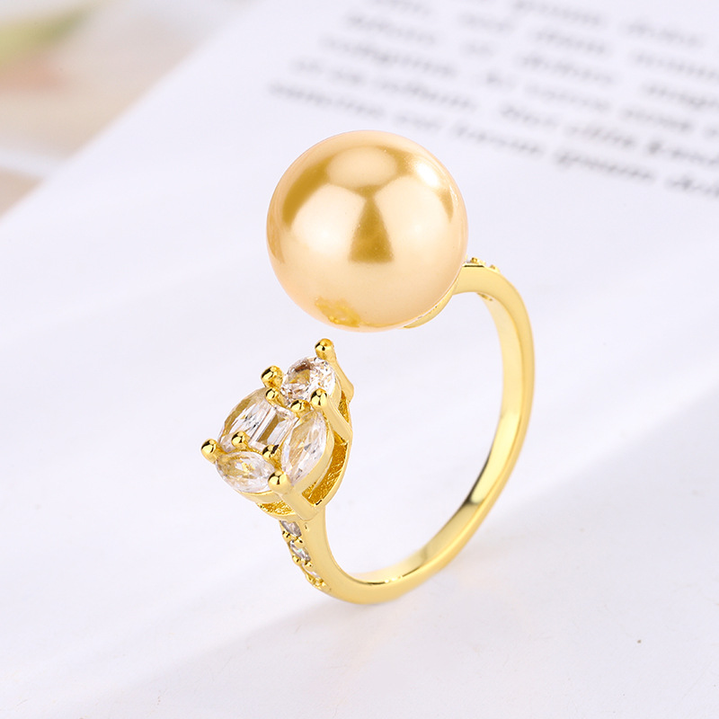 2024 nueva joyería cobre chapado en platino perla estilo simple anillo diario mujer 12mm al por mayor